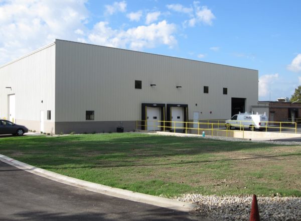 Steel warehouse buildings are a great option for quick expansion. This image is an example of a Capital Steel warehouse construction.