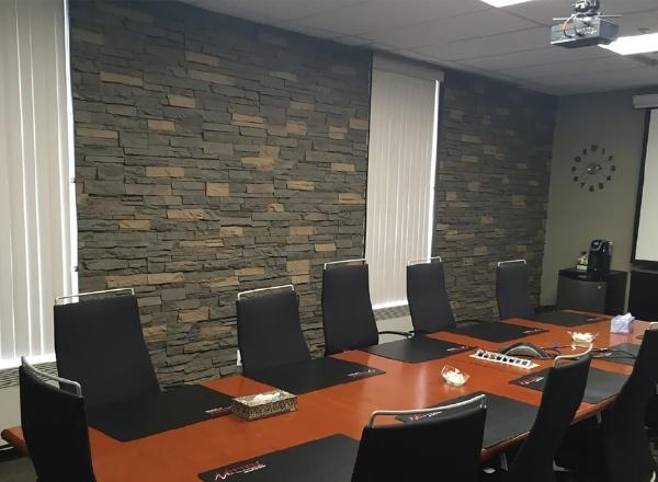 This image shows GenStone faux stone being used on interior office walls.
