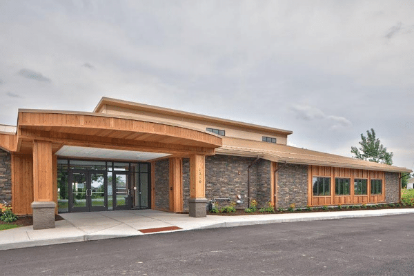 Faux stone is a brilliant way to finish metal buildings.